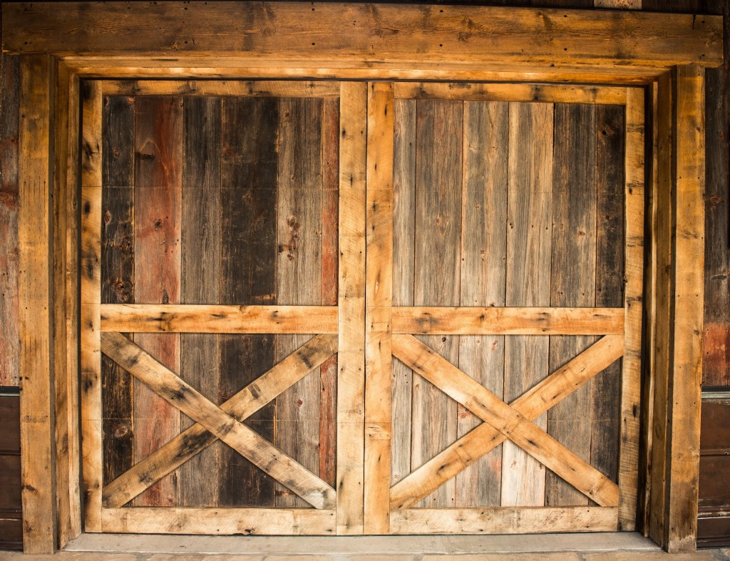 hardwood floor installation buffalo ny of reclaimed wood species distinguished boards beams for weathered grey pine and mixed oak barn wood siding garage door in a traditional barn style