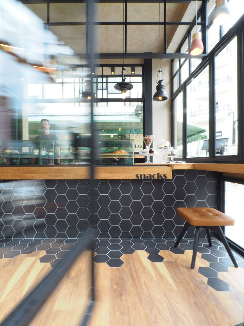 15 Amazing Hardwood Floor to Carpet Transition 2024 free download hardwood floor to carpet transition of hexagon tiles transition into wood flooring inside this cafe in inside inside this cafe black hexagon tiles wrap from the counter to the floor where th